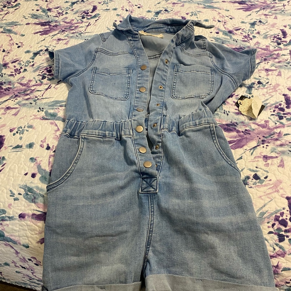 Jean romper. Super cute. Never worn NWT. Size was too big.